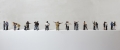 Jitish Kallat, Circadian Rhyme- 4, 2012-13, 24 figurines  (each approx. 30 to 38 cm high), plinth dimension (91 cm x 38 cm x 457 cm) paint, resin, aluminum, steel, 91 x 457 x 38 cm | 35.83 x 179.92 x 14.96 in, # JKAL0073 