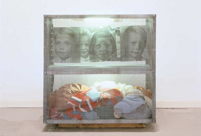 Christian Boltanski, Reliquaire - Les Linges, 1996, black and white photography, fabrics and neon lights in a metal box, 91 x 91 x 31 cm 